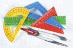 Instruments for drawing in school. Ruler and compass. Close-up.